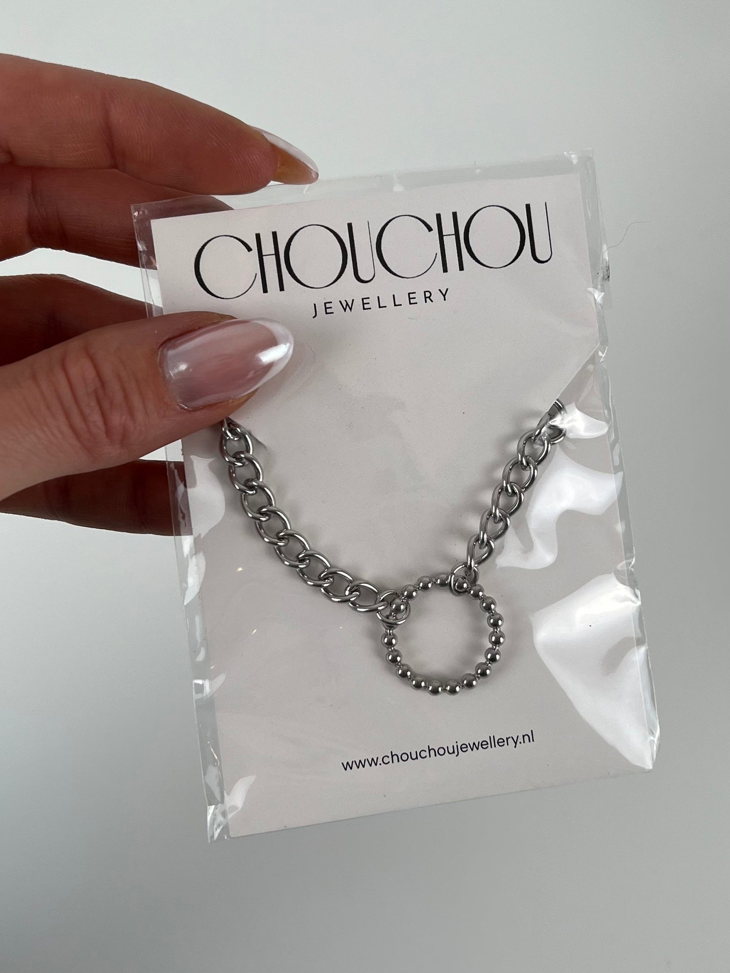 Ketting schakel met rondje met patroon
