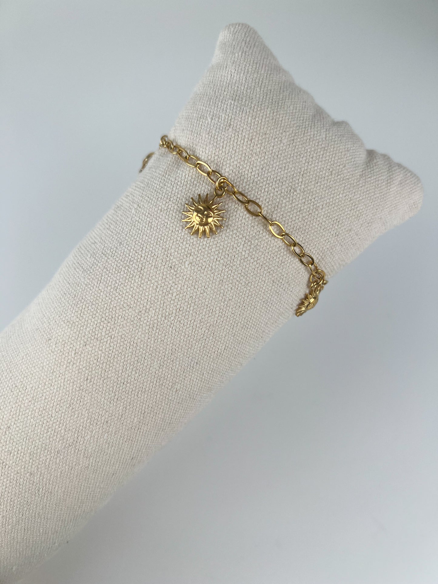 Schakel armband met zonnetjes