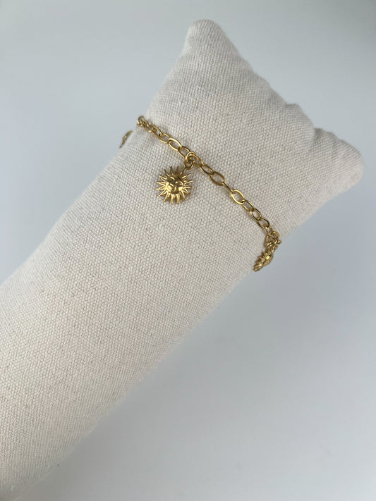 Schakel armband met zonnetjes