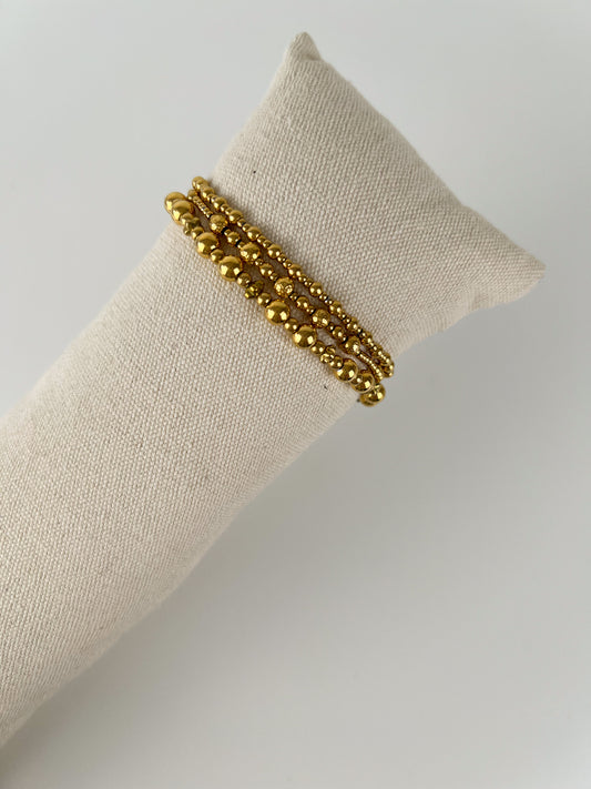 Elastisch armbandjes setje met gouden kraaltjes