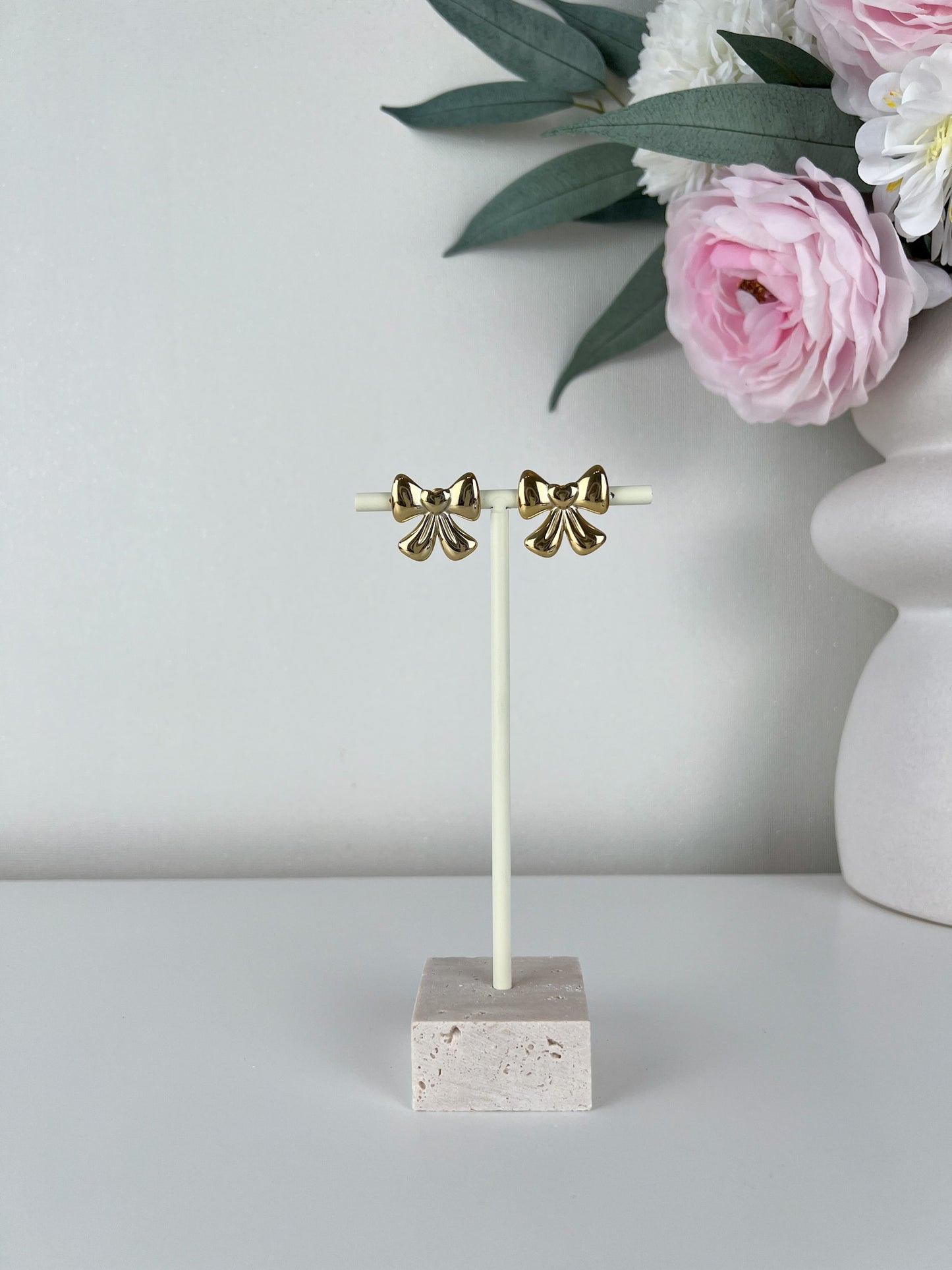 Studs oorbellen bow