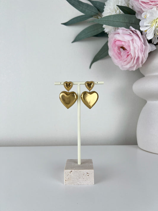 Statement oorbellen vol hart