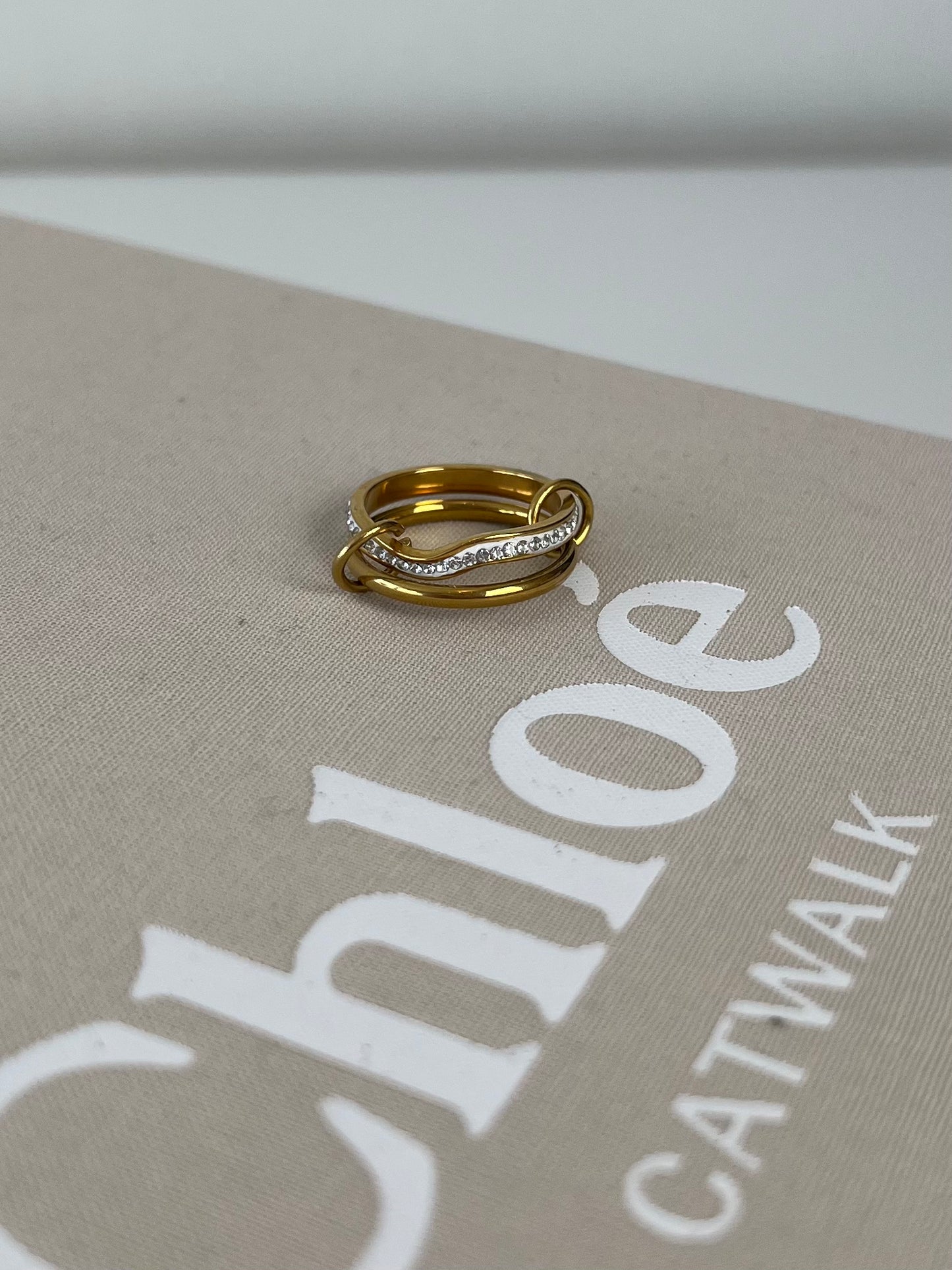 Two rings connected with strass