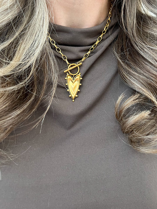 Ketting met voorsluiting en hangend hart bedel