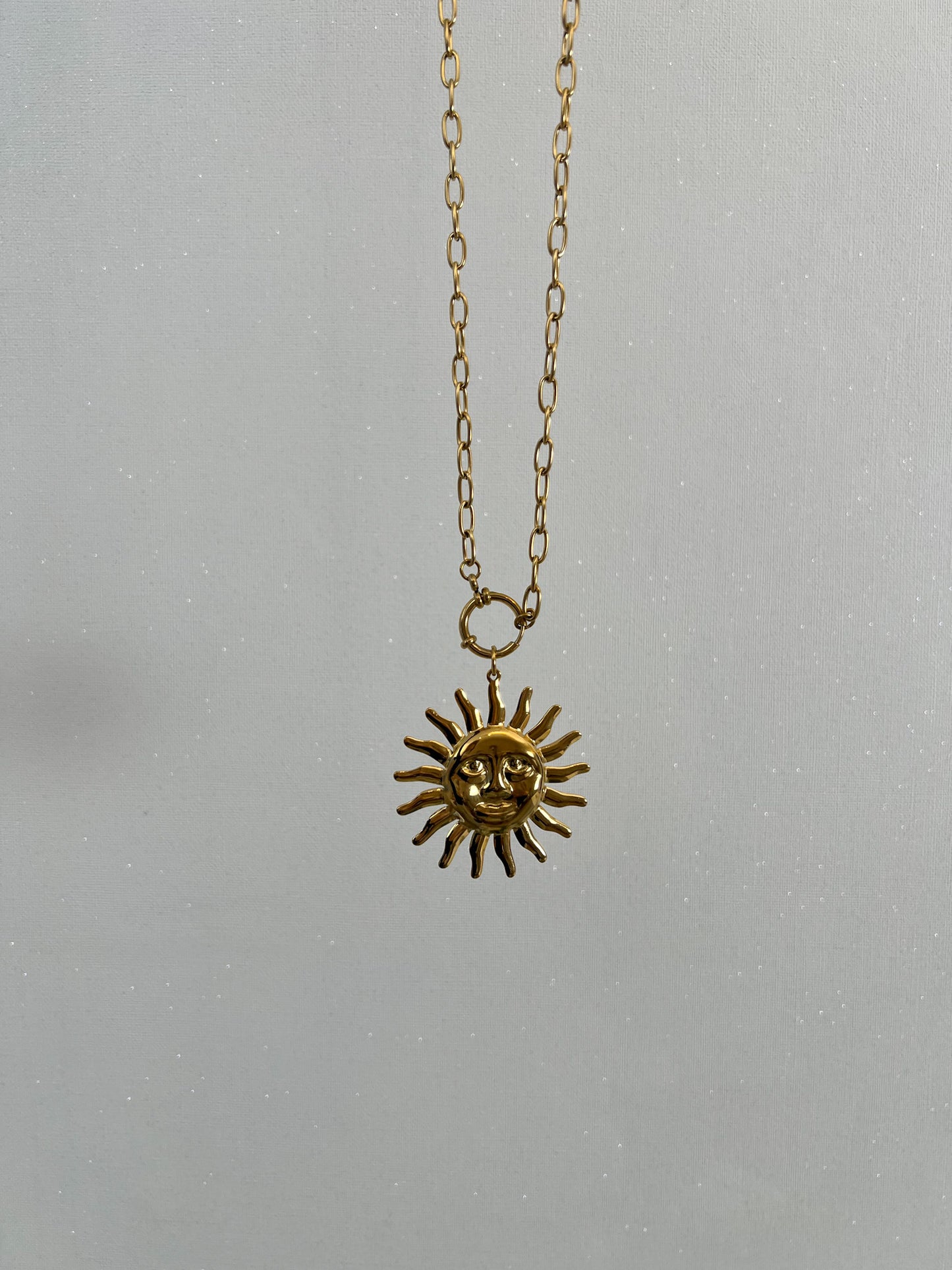 Lange ketting met groot zonnetje