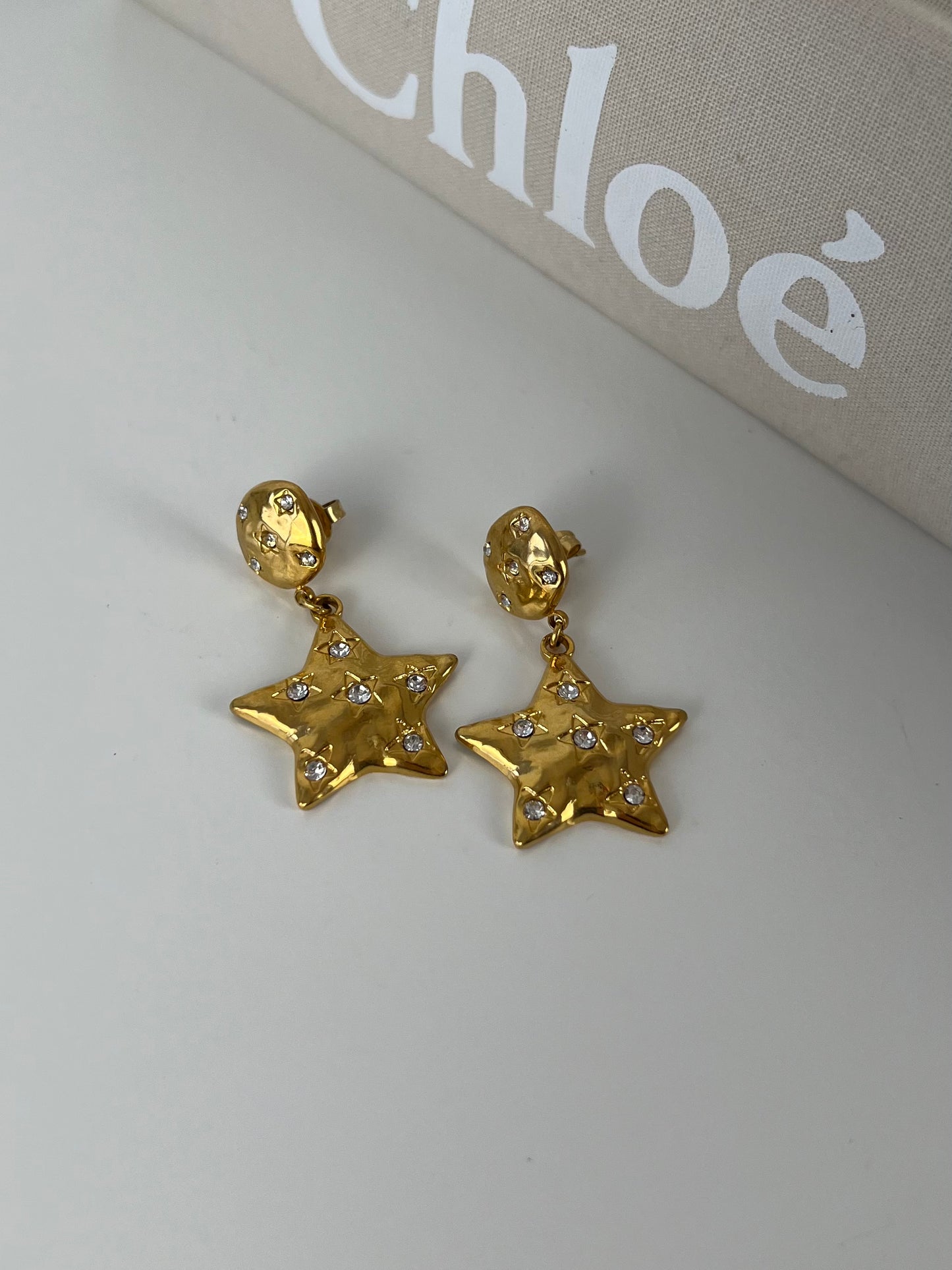 Oorbellen ster hanger met strass