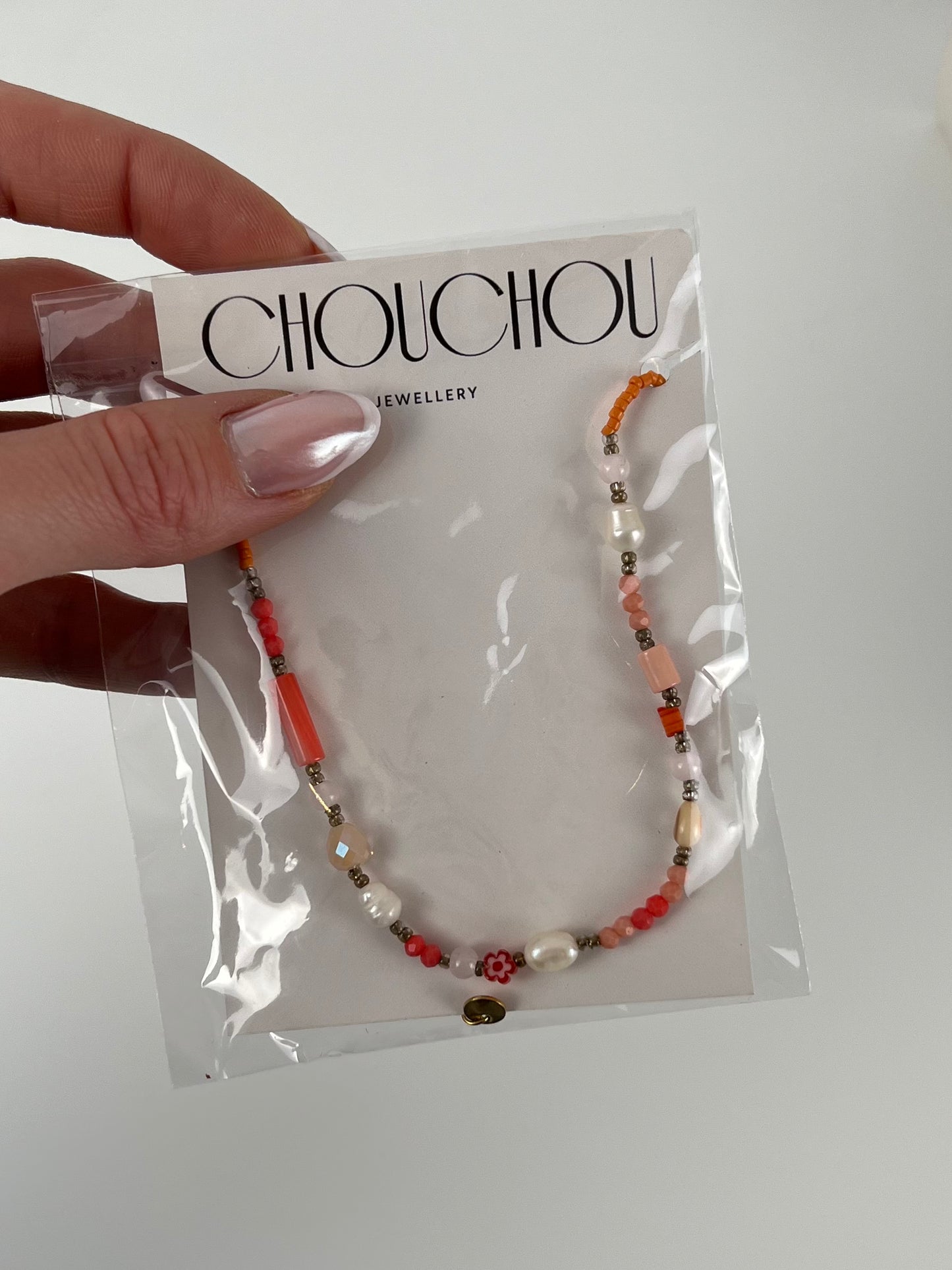 Ketting gekleurde kraaltjes oranje/paars