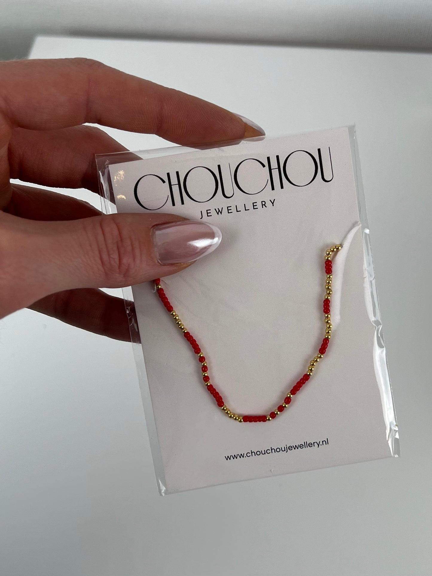 Ketting gekleurde kraaltjes en goud