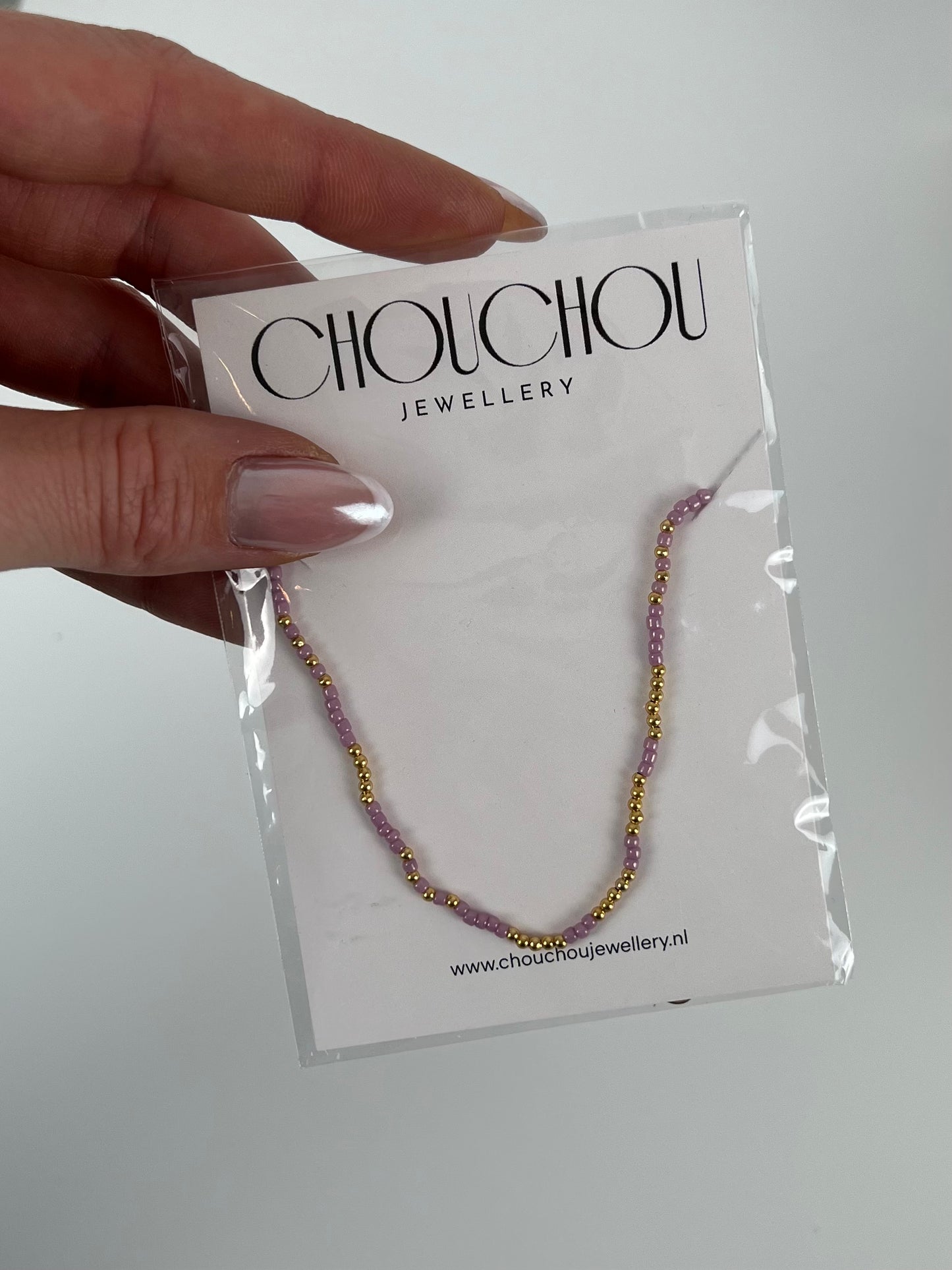 Ketting gekleurde kraaltjes en goud