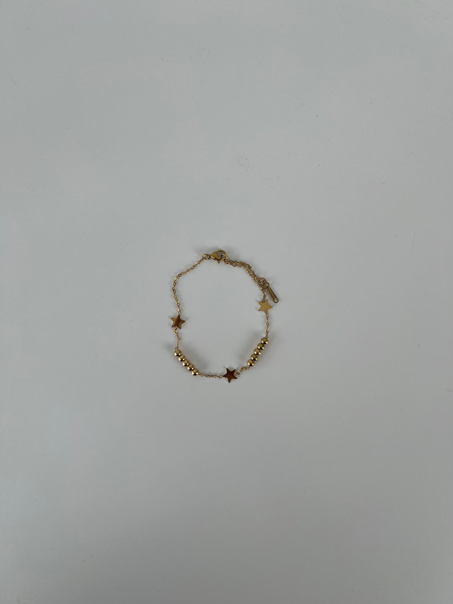 Armband met balletjes en sterretjes