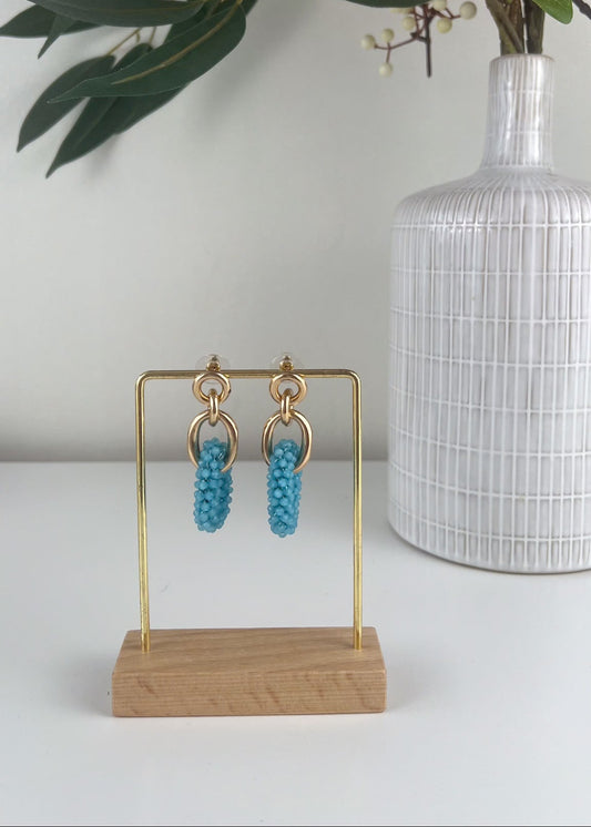 Oorbellen kraaltjes rond blauw