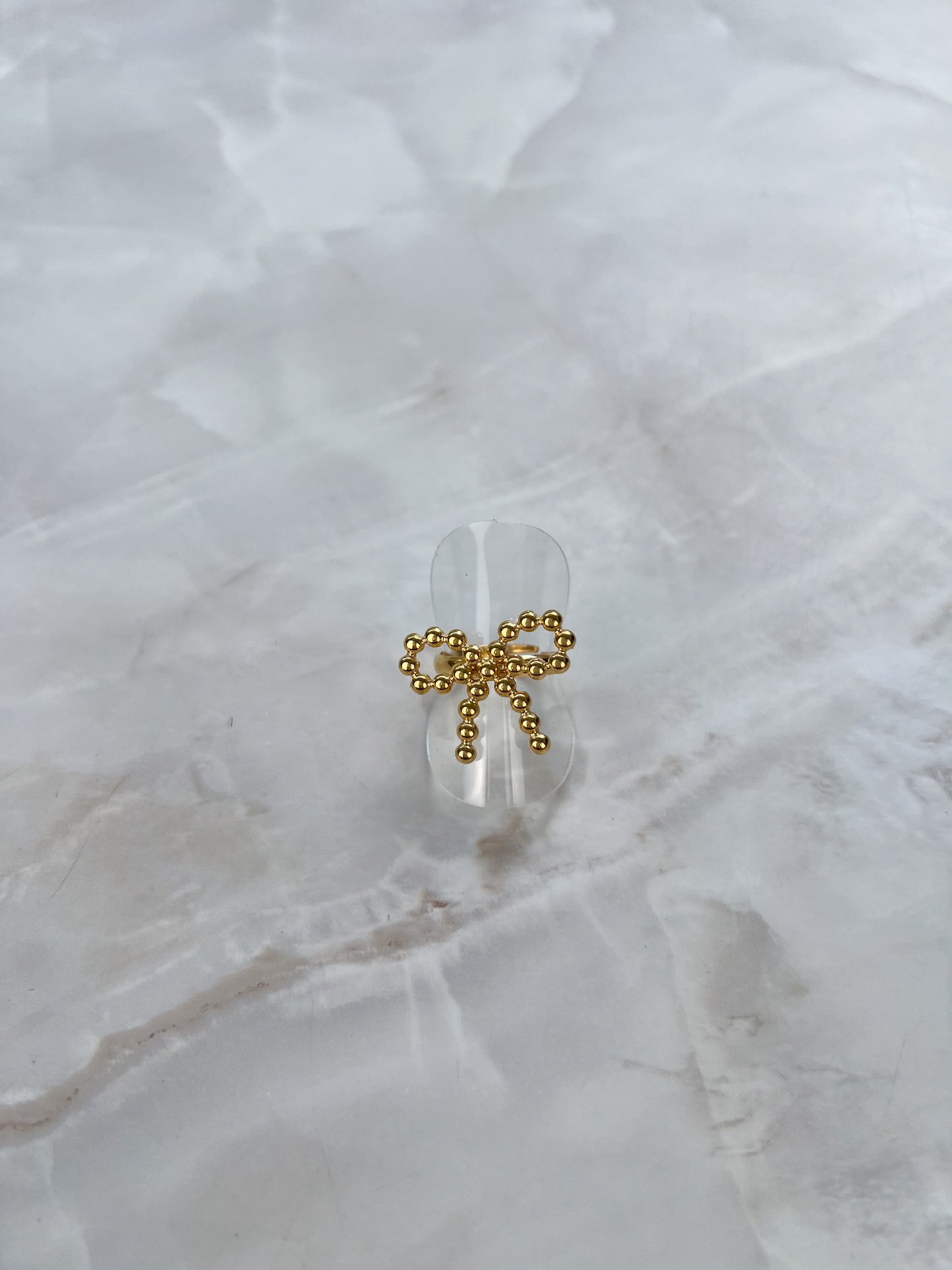 Ring strik met bolletjes patroon