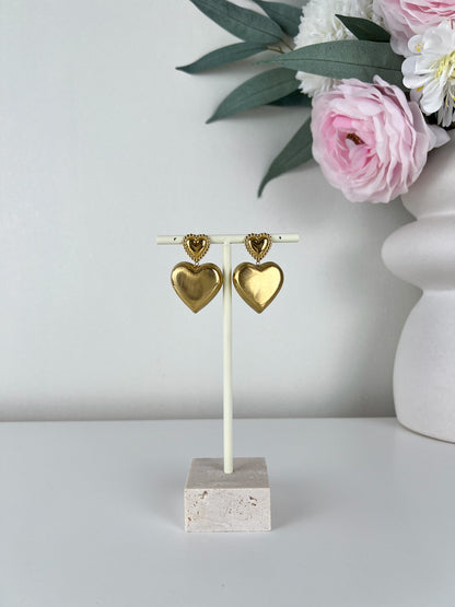 Statement oorbellen vol hart