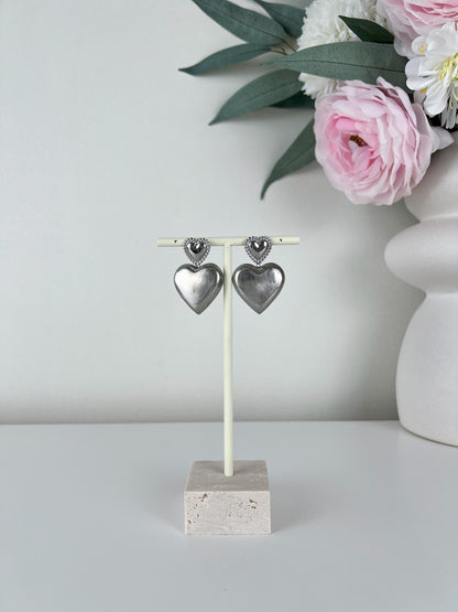 Statement oorbellen vol hart