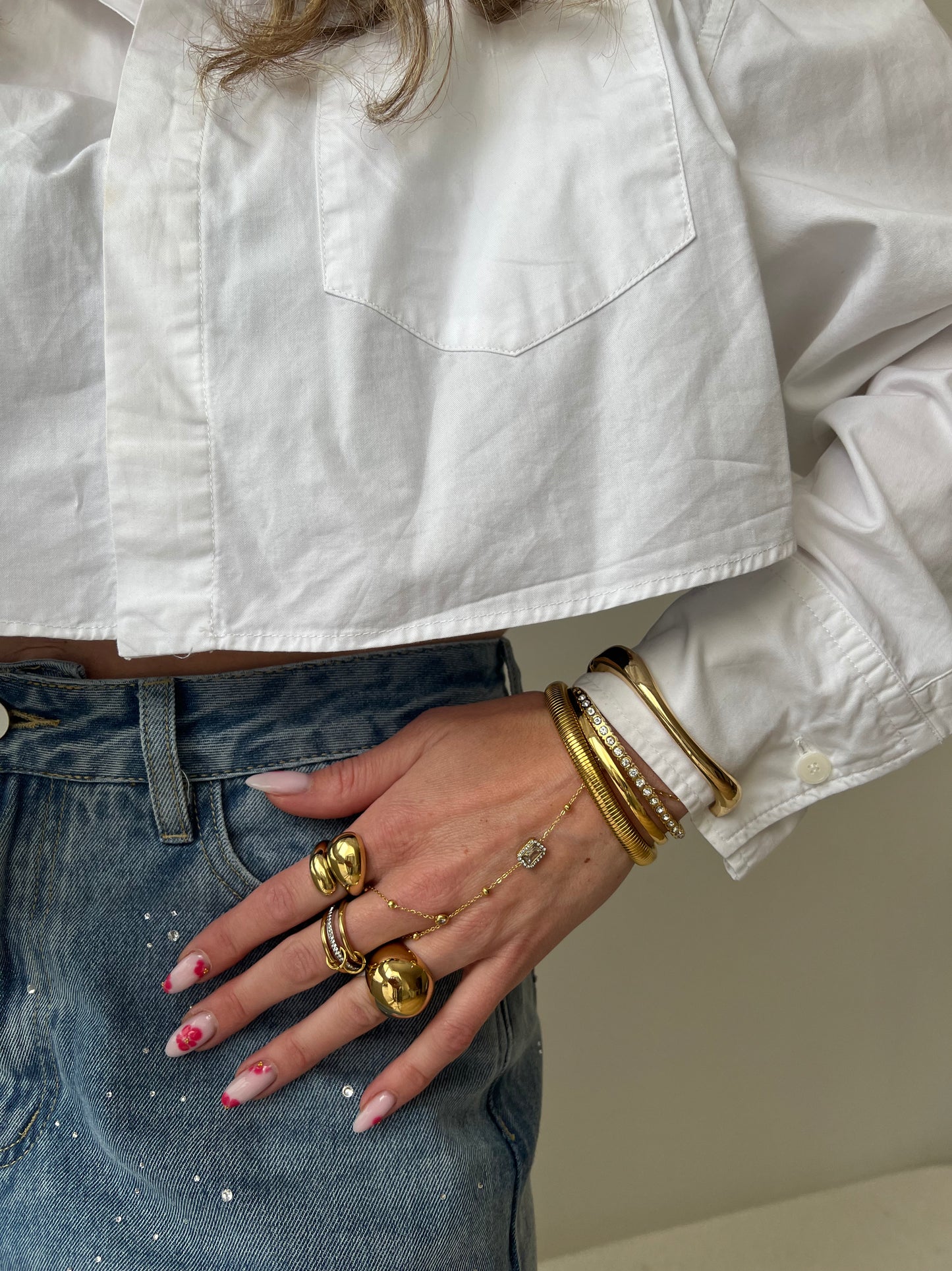 Hand chain met statement steen