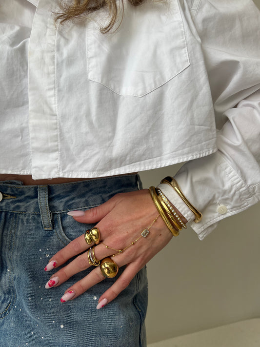 Hand chain met statement steen