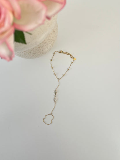 Hand chain met druppelvormige statement stenen