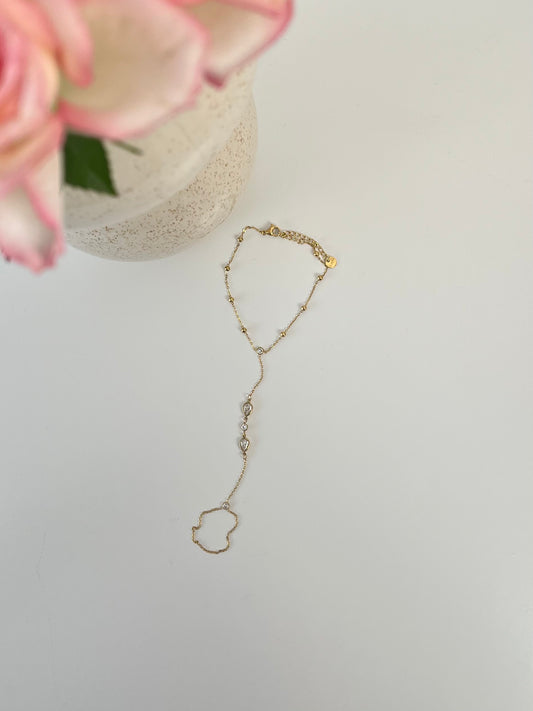 Hand chain met druppelvormige statement stenen