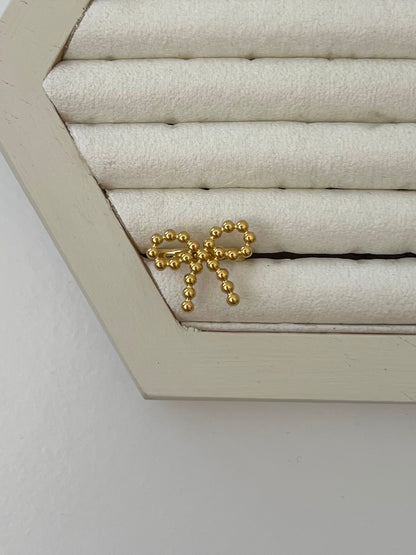 Ring strik met bolletjes patroon