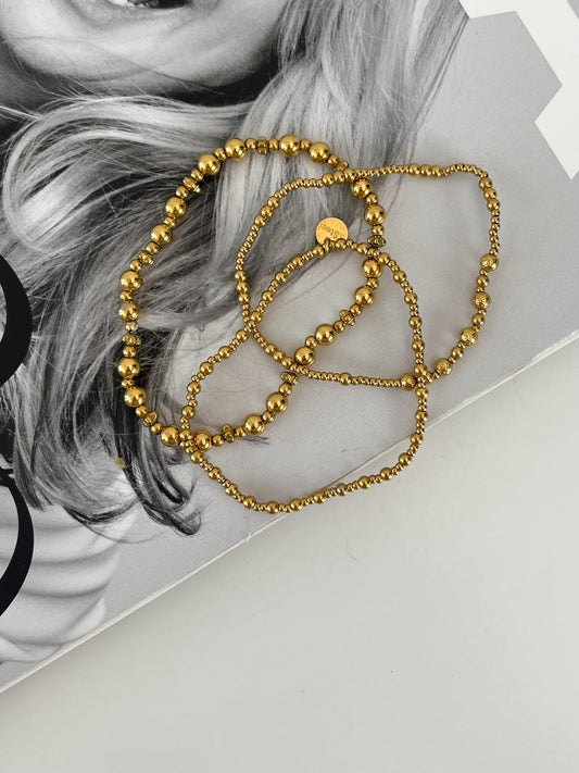 Elastisch armbandjes setje met gouden kraaltjes